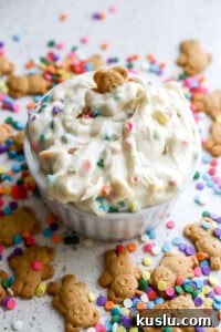 High-Protein Dunkaroo Dip: 5-Minute Party Snack 7 Side angle of easy dessert recipe with animal crackers.