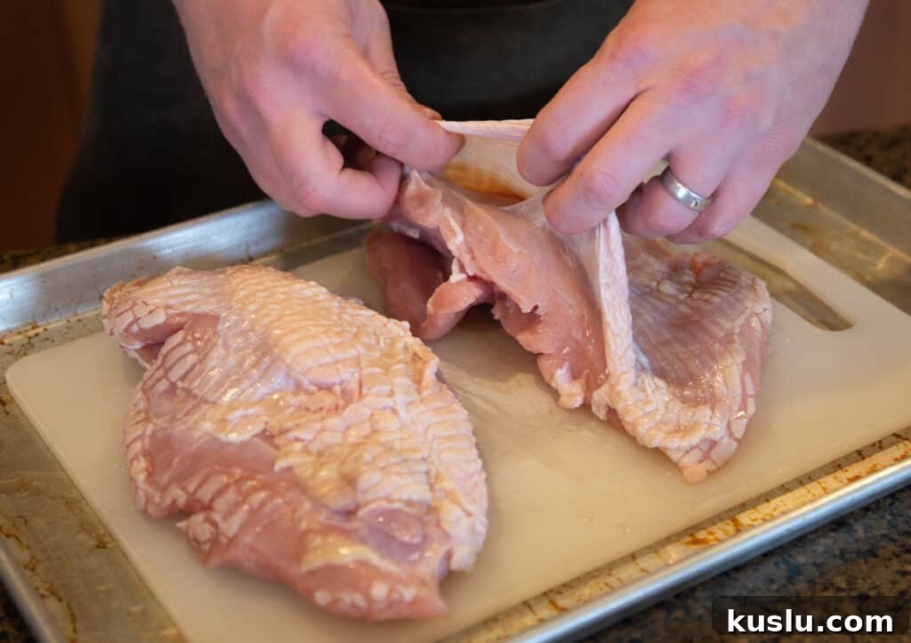Cajun Grilled Turkey Breast Recipe for Juicy, Flavorful Results 4 Using fingers to loosen and separate a pocket between skin and meat