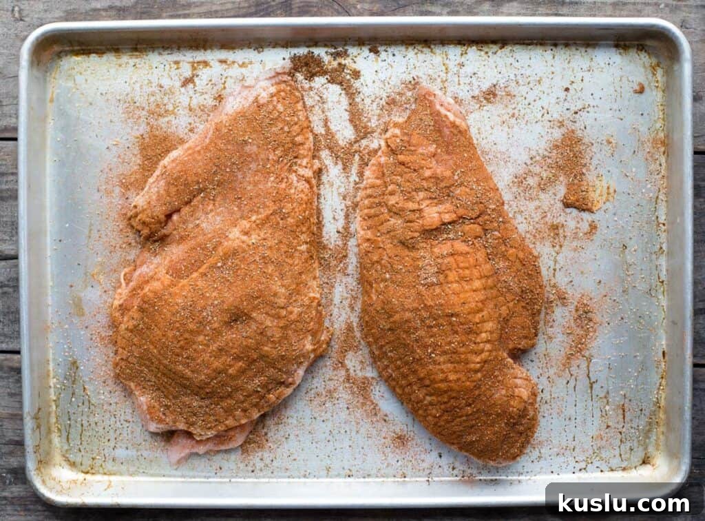 Cajun Grilled Turkey Breast Recipe for Juicy, Flavorful Results 5 Seasoned meat on a platter prior to grilling.