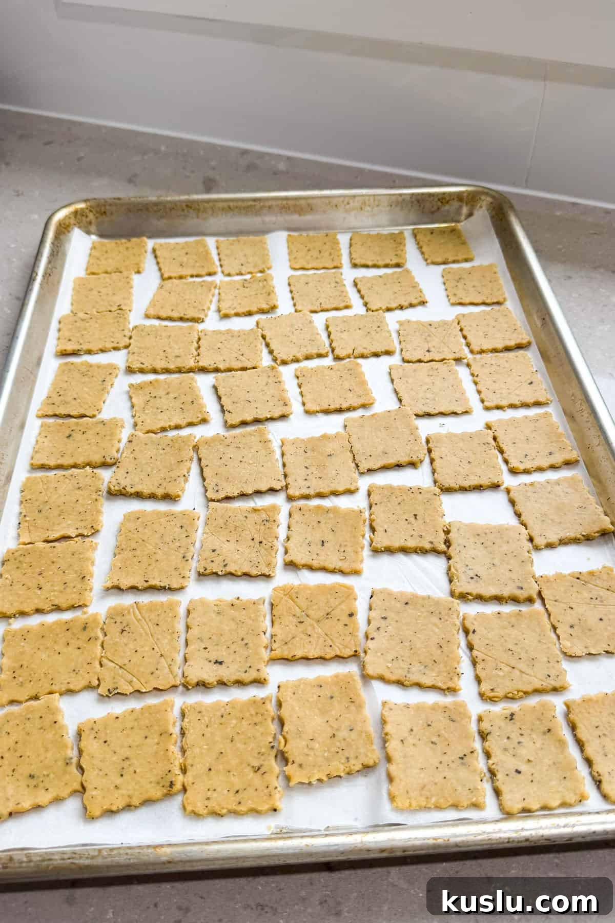 Crackers on baking sheet.