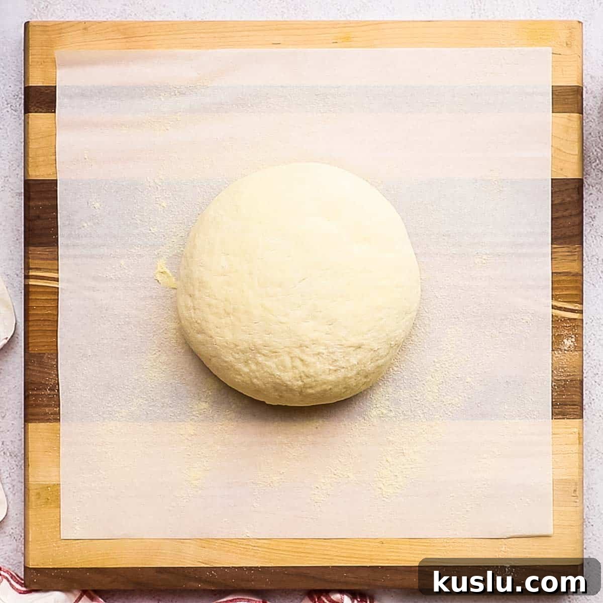 How to Make Thick Crust Pizza at Home: Crispy Edge, Chewy Center 11 pizza bowl on a parchment paper