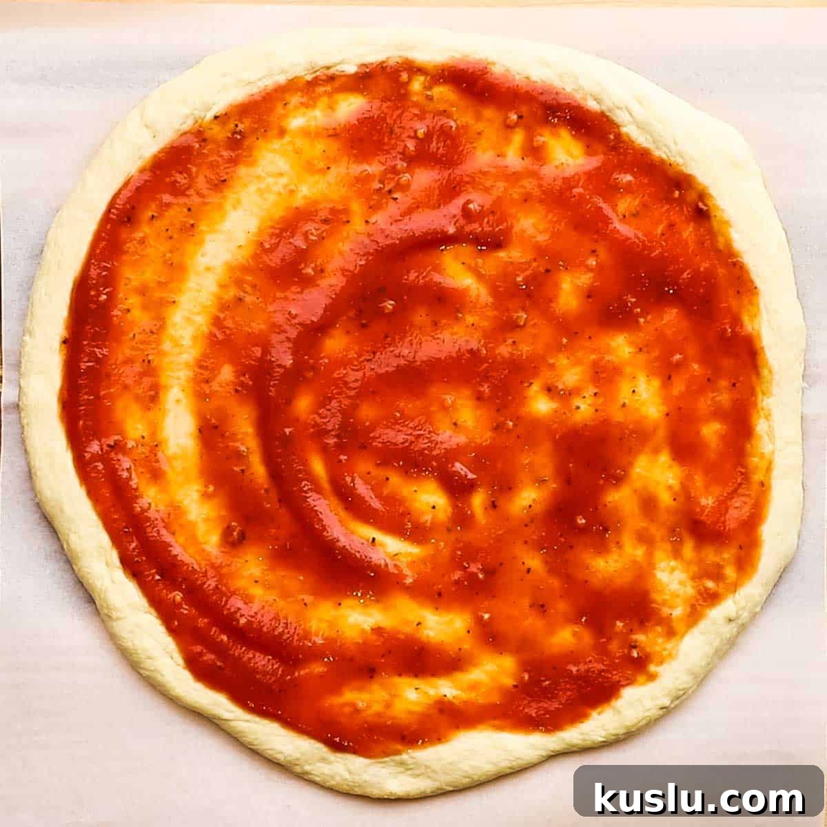 How to Make Thick Crust Pizza at Home: Crispy Edge, Chewy Center 13 pizza sauce spread on the dough