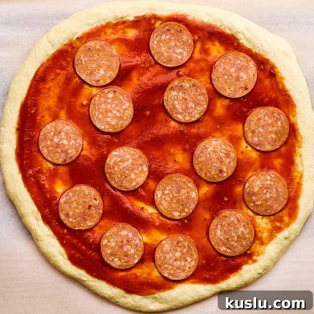 How to Make Thick Crust Pizza at Home: Crispy Edge, Chewy Center 14 pepperoni slices on top of the sauce