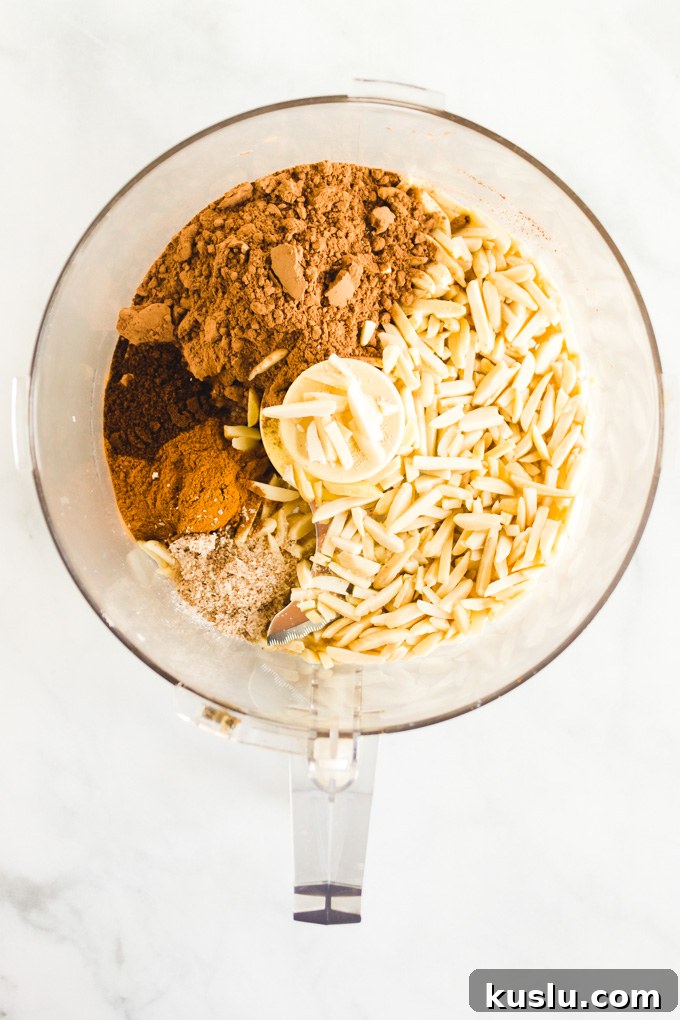Date Sweetened Rum Balls - Soft, chocolate-y, boozy balls coated in chocolate sprinkles.