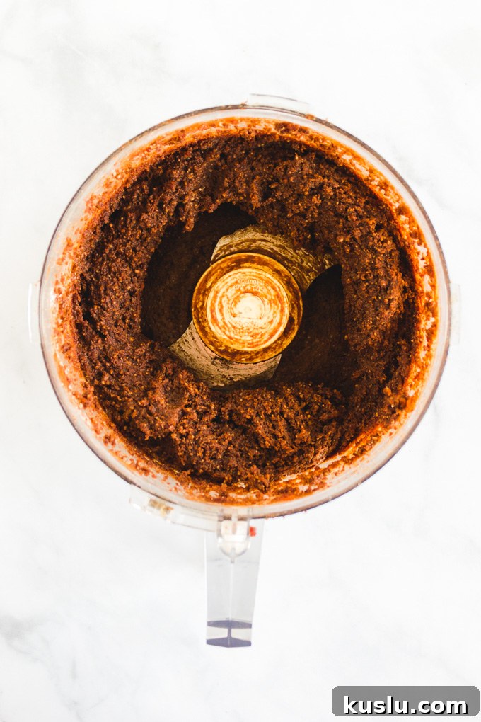 Date Sweetened Rum Balls - Soft, chocolate-y, boozy balls coated in chocolate sprinkles.