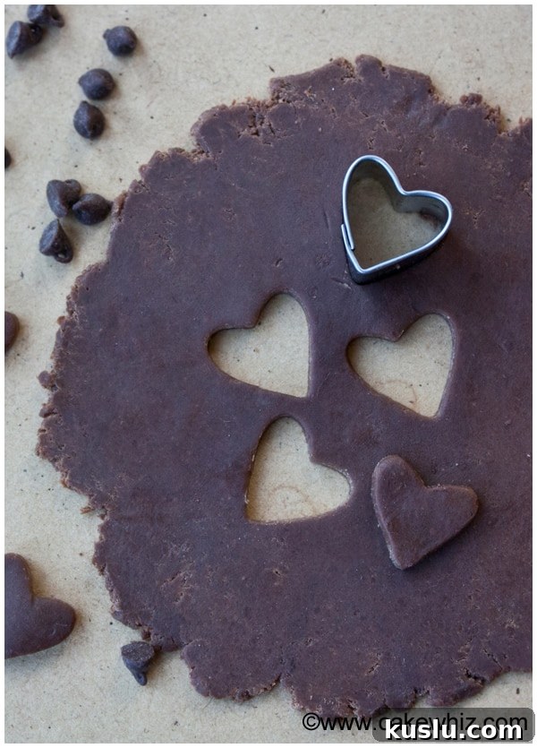 Make Modeling Chocolate (Candy Clay): Step-by-Step Recipe 4 Edible Chocolate Clay Rolled Out on Table With Small Cookie Cutter