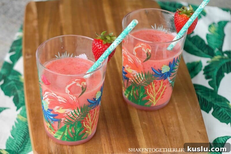 Tropical and fruity and oh so simple, our family loves a 2 Ingredient Strawberry Orange Smoothie!