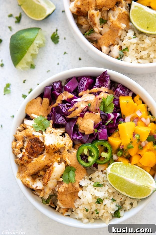Chipotle Lime Fish Taco Bowl with Creamy Mayo Sauce (Whole30) 3 overhead shot of a healthy whole30 paleo fish taco bowl with cilantro lime cauliflower rice