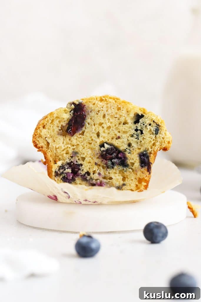 Gluten-Free Pumpkin French Toast Casserole Recipe for Fall Brunch 11 gluten-free blueberry muffin cut in half to reveal a fluffy texture