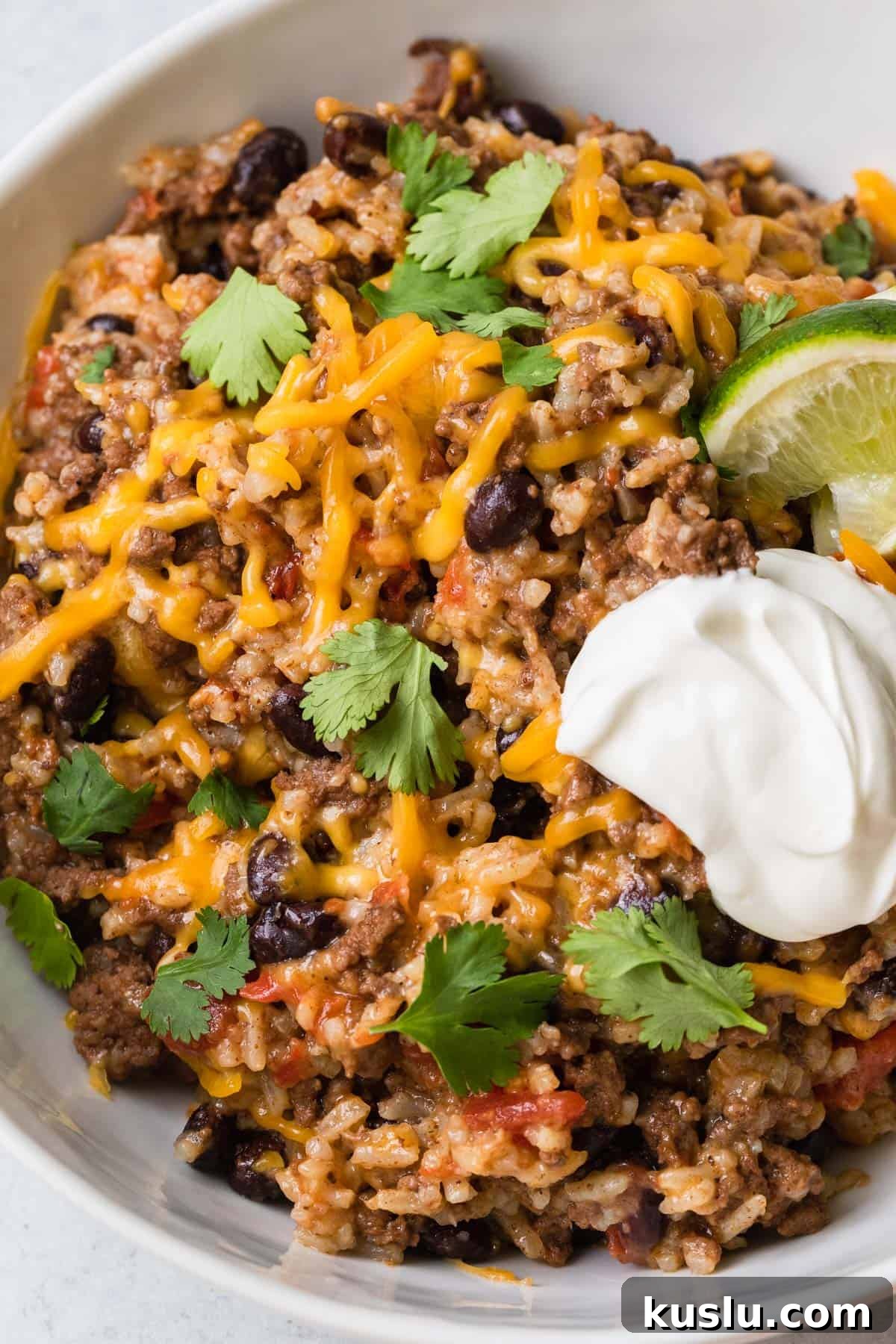 the completed instant pot ground beef and rice recipe served in a bowl