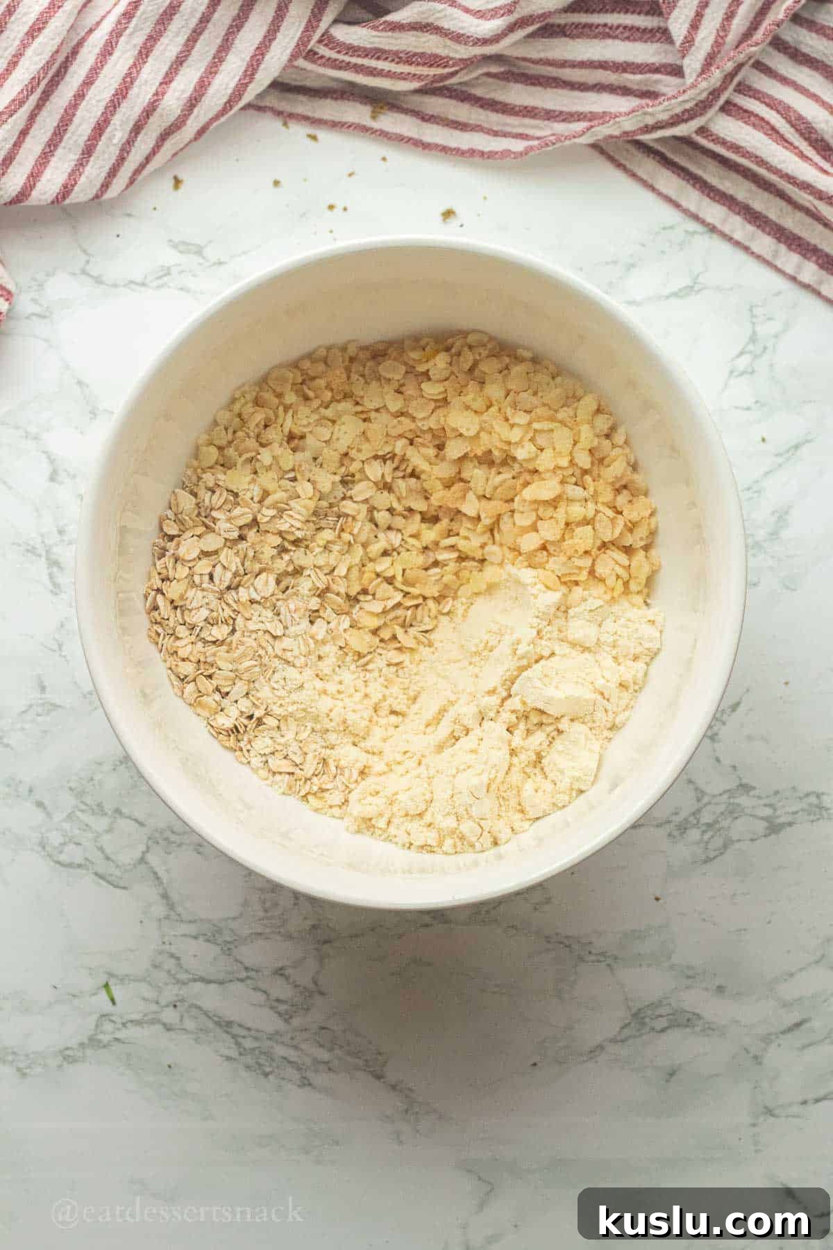 Pistachio Energy Protein Balls for Quick Snacks 5 Dry ingredients for protein balls in bowl.
