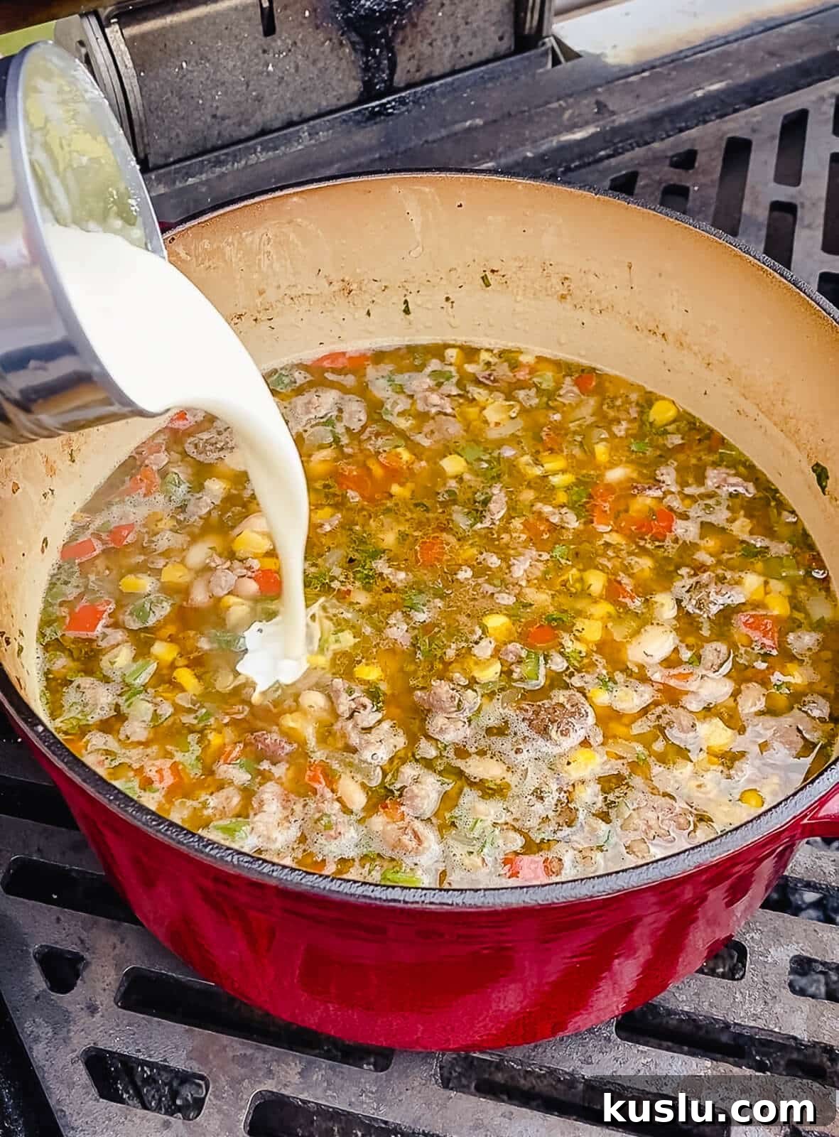 cream being added to chicken chili