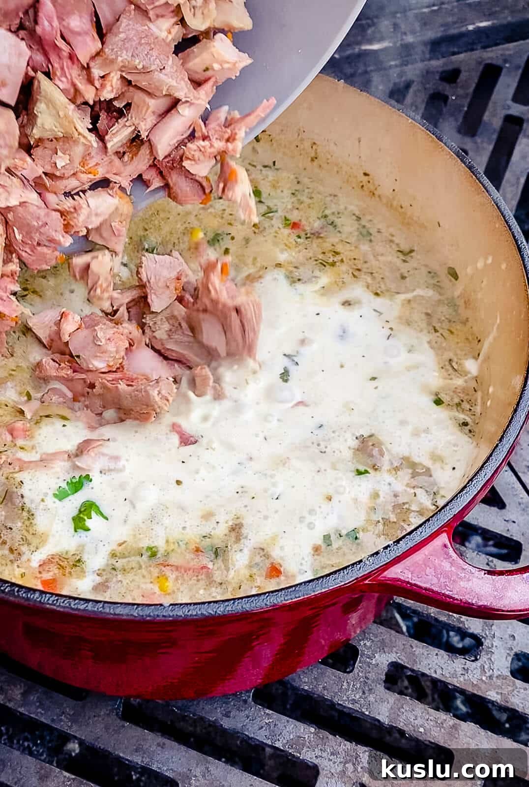 meat being added to chicken chili