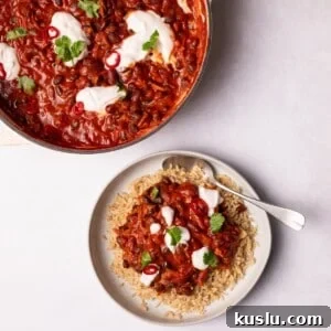 Vegan Chili served on a plate with brown rice.