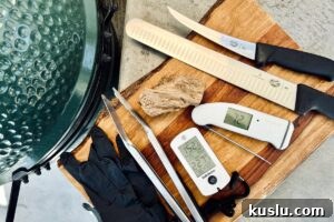 essential smoker accessories next to big green egg