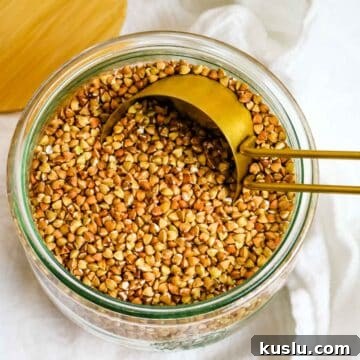 roasted buckwheat kasha in glass container.