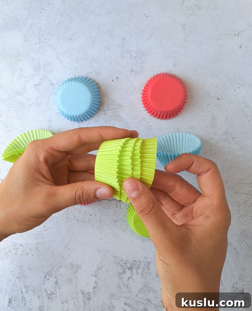 DIY Cupcake Liner Flowers: Simple Craft Ideas & Step-by-Step Guide 4 Four cupcake liners stacked