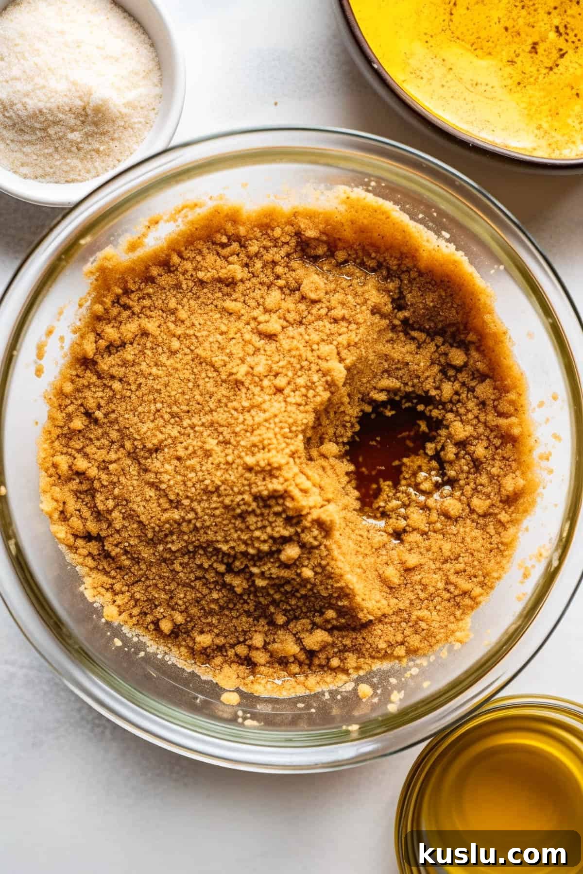 Graham cracker crust for pumpkin cheesecake bars.