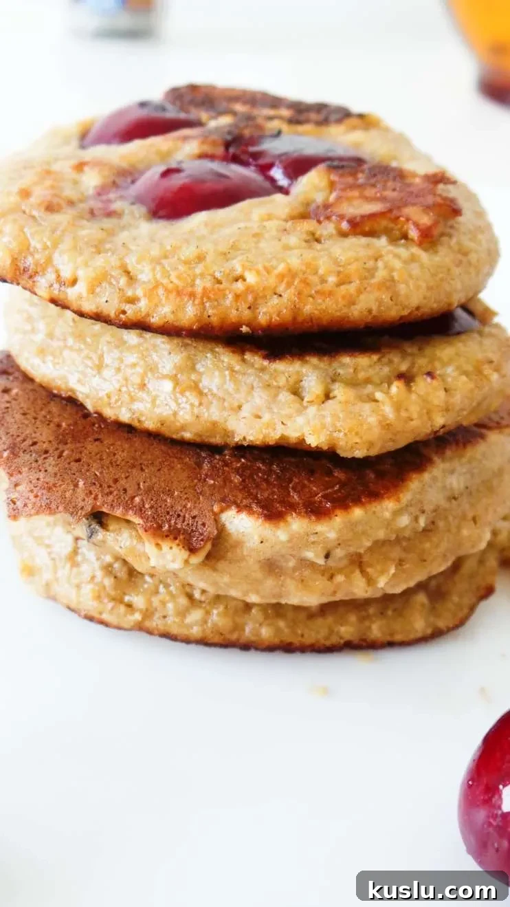 Healthy cherry pancakes! Made with oats, yogurt and honey these are an easy healthy breakfast that you can eat on the go! Ready in 10 minutes, also great for toddlers and kids!