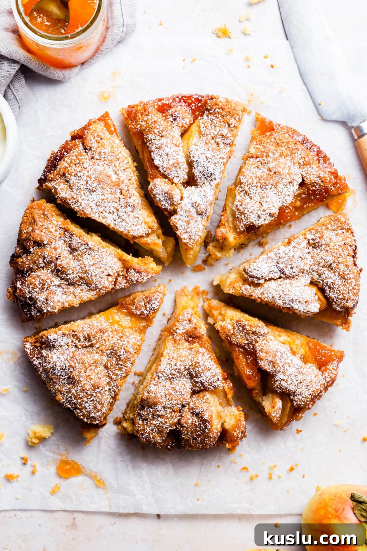 overhead close up at easy apple cake cut into eight individual slices