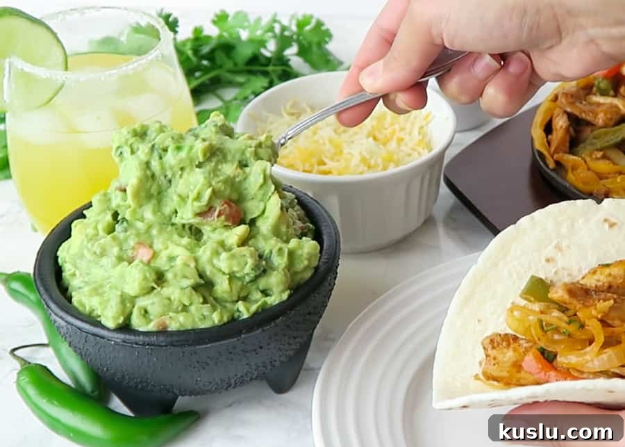 authentic guacamole being served on a taco