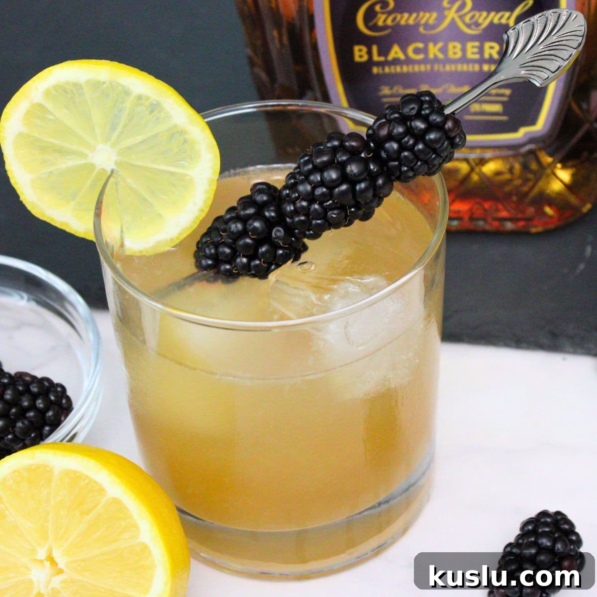 8 Refreshing Blackberry Crown Cocktail Recipes to Try Today 4 crown royal blackberry whiskey sour cocktail dinners done quick featured image