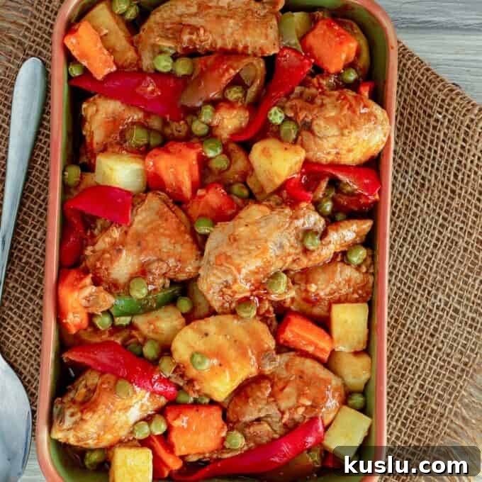 Pineapple Chicken Afritada in a serving dish