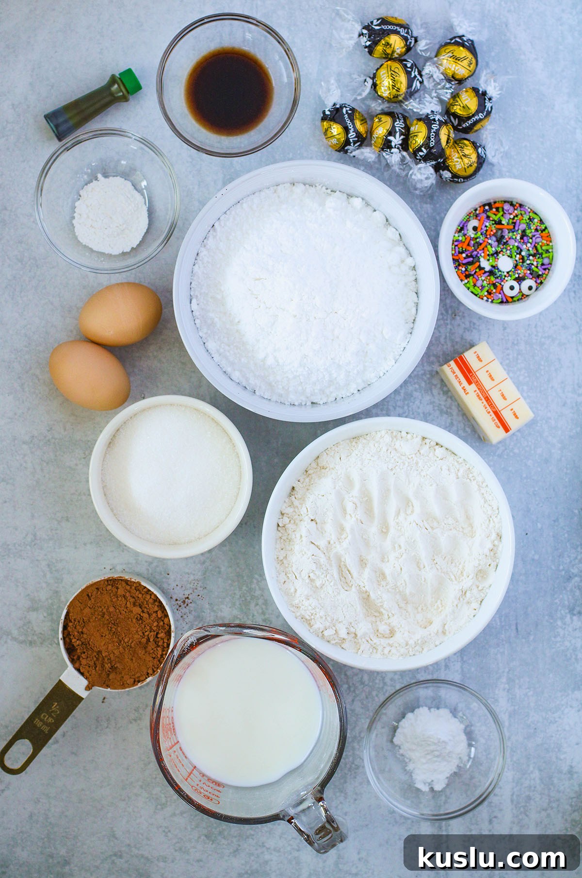 Spider Donuts Guide: How to Make Creepy Halloween Donuts 3 Ingredients to make spider donuts set out on the counter top.