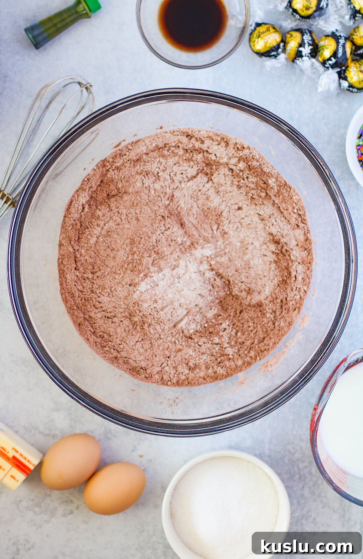 Spider Donuts Guide: How to Make Creepy Halloween Donuts 4 Flour, baking powder, baking soda, and cocoa powder in a mixing bowl.
