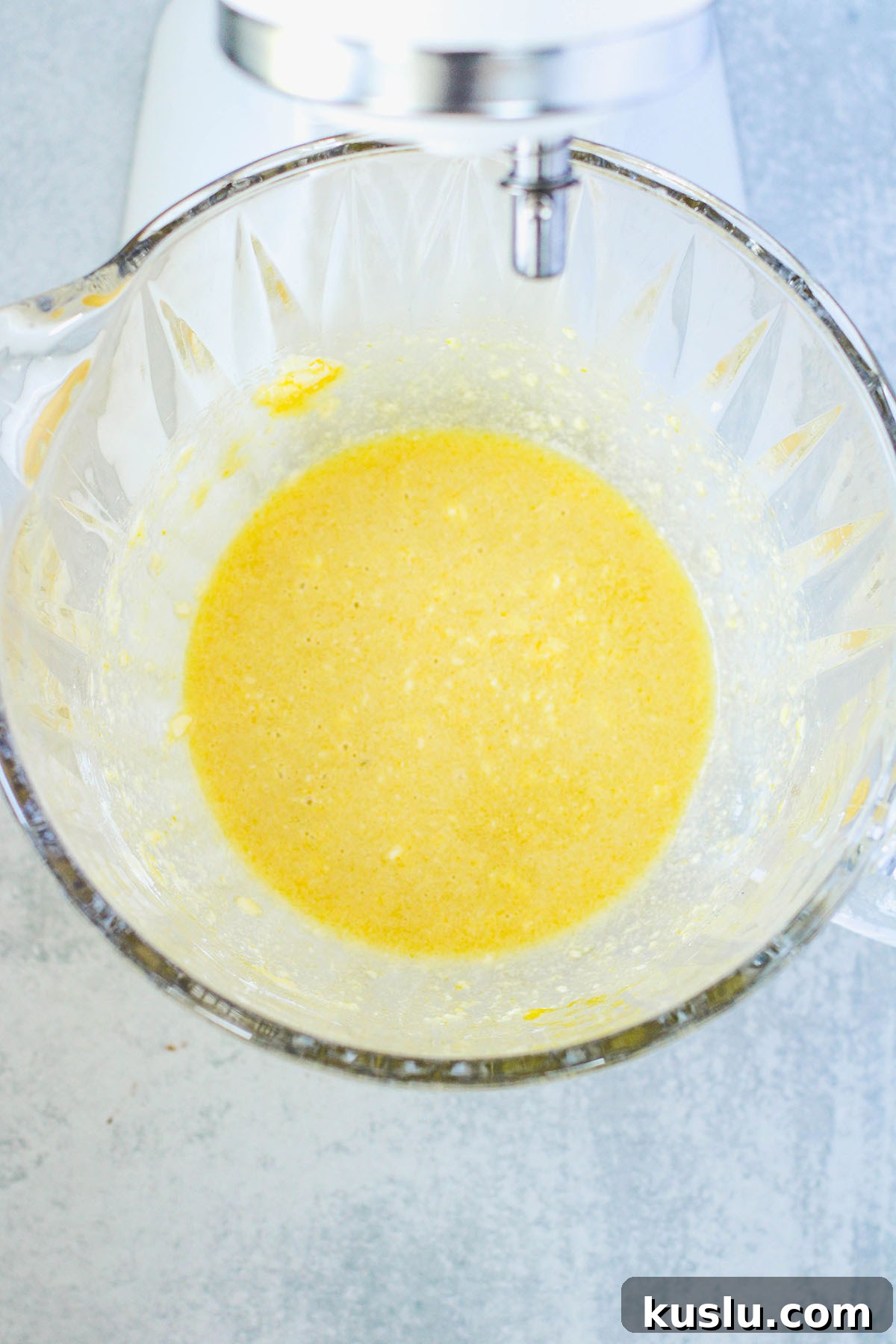Spider Donuts Guide: How to Make Creepy Halloween Donuts 5 Butter, sugar, vanilla, and eggs in a mixing bowl.