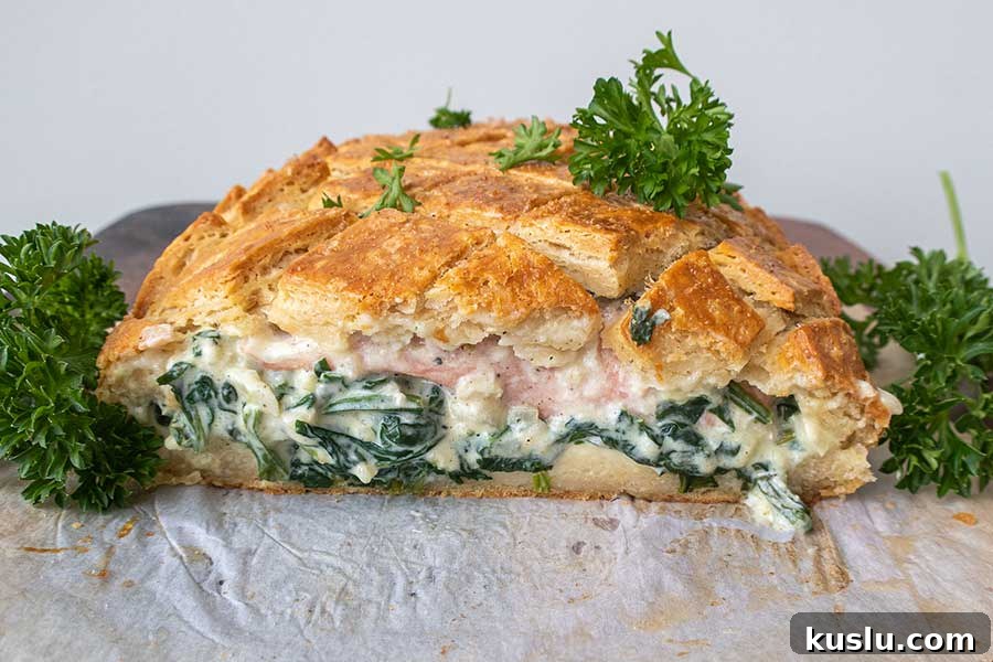 a slice of gluten free salmon wellington