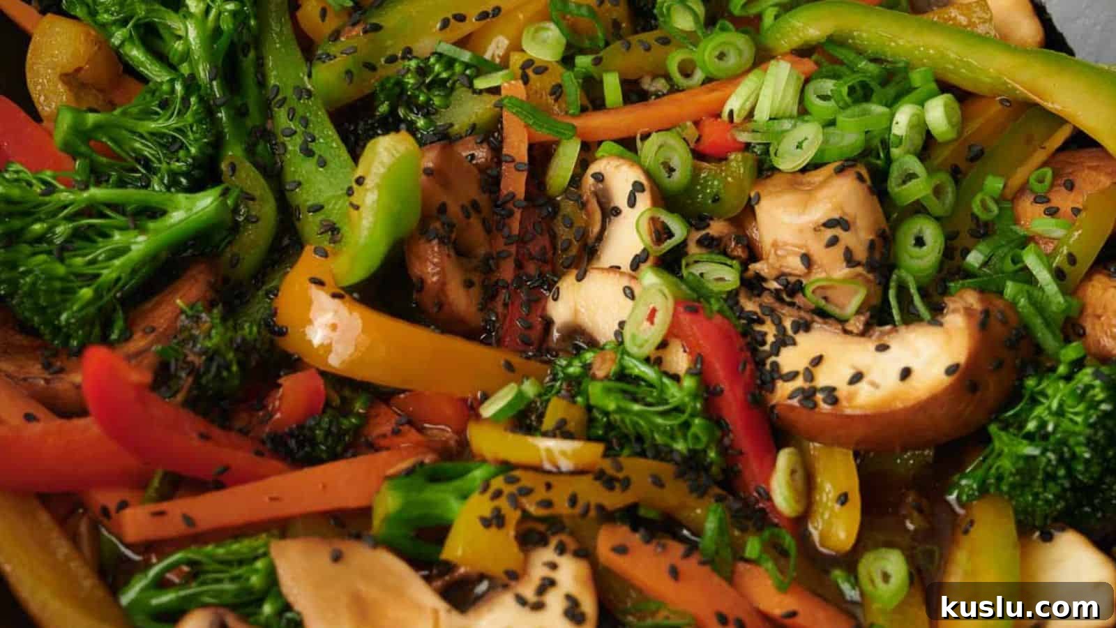 A colorful vegetable stir fry on a plate.
