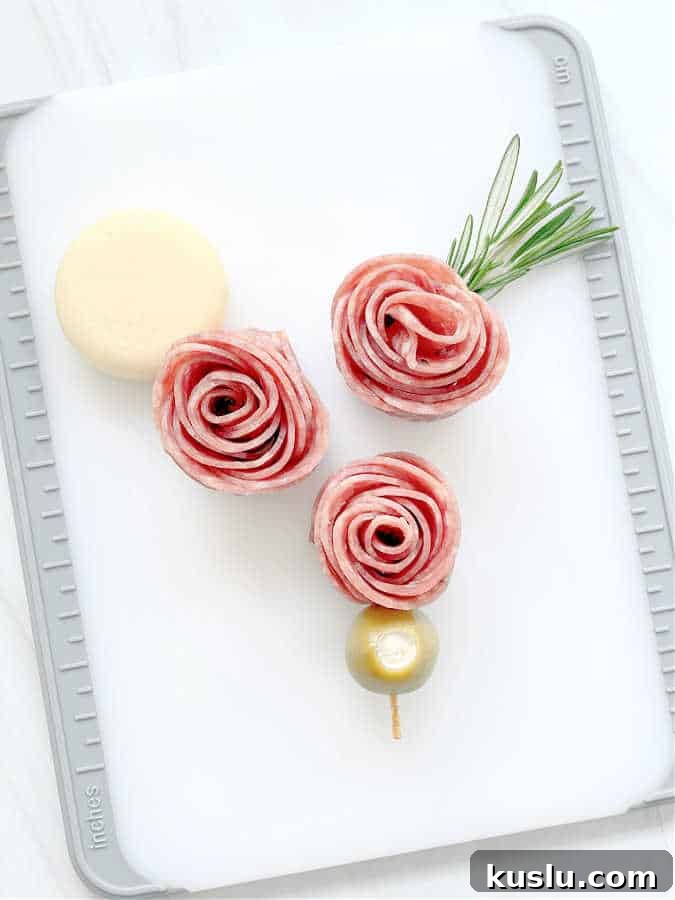 salami rosebuds displayed on a cutting board