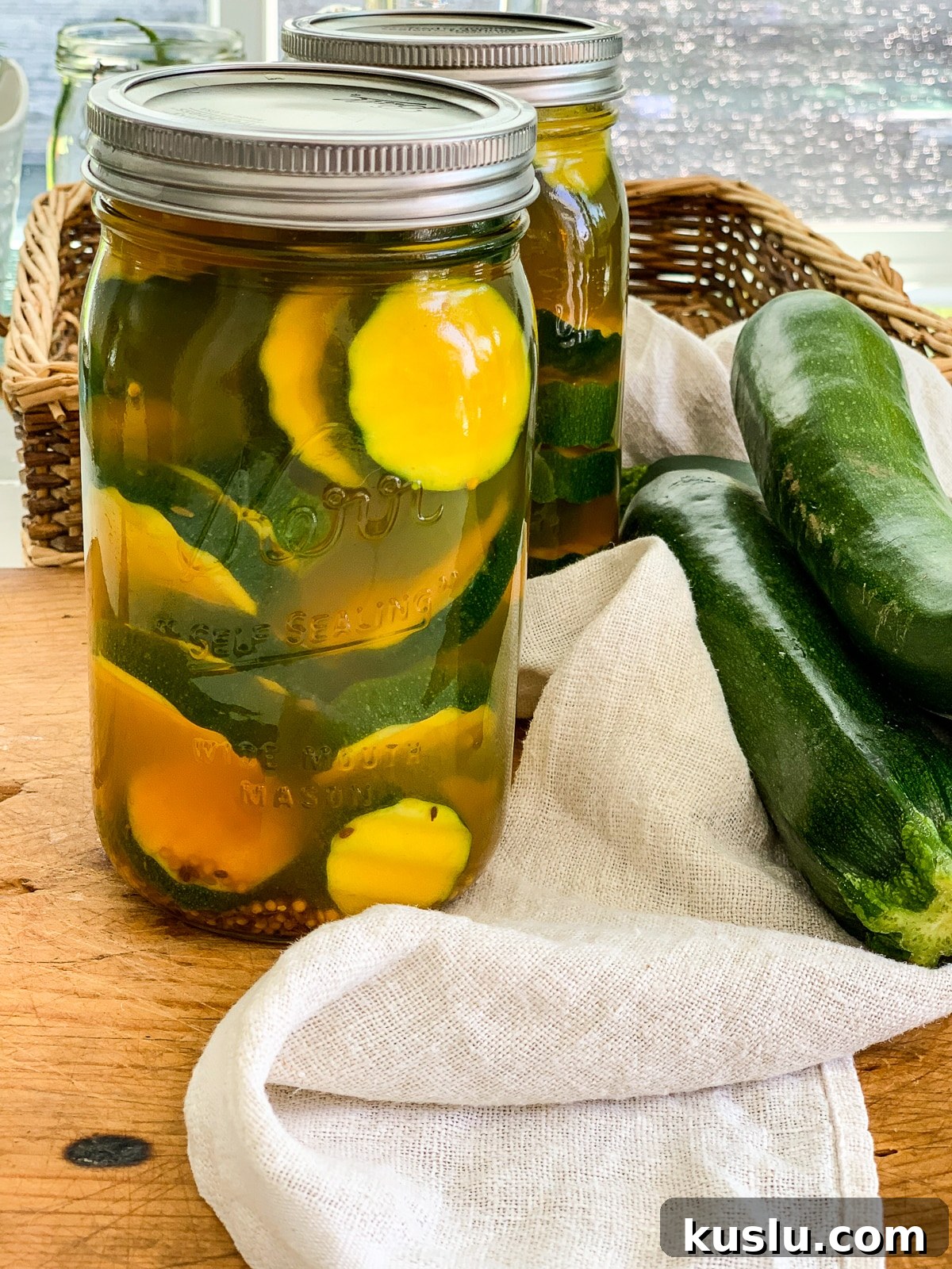 Quick Refrigerator Zucchini Pickles — No Canning Needed 4 Two jars of pickles made from zucchini squash