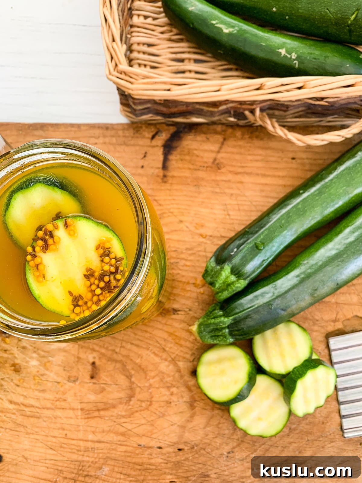 Quick Refrigerator Zucchini Pickles — No Canning Needed 6 Top view of jar filled with zucchini pickles