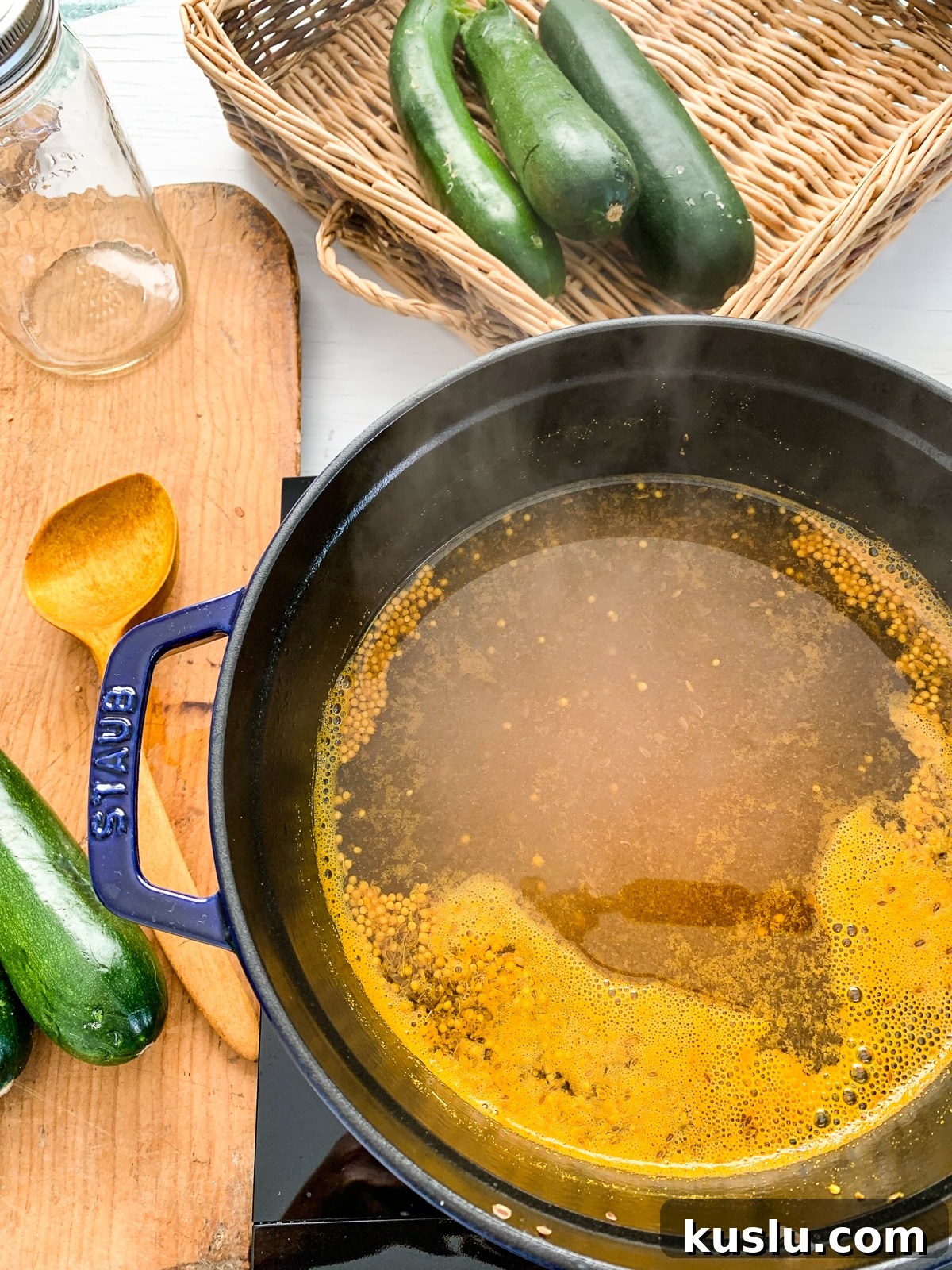 Quick Refrigerator Zucchini Pickles — No Canning Needed 10 Zucchini pickle brine in a pot