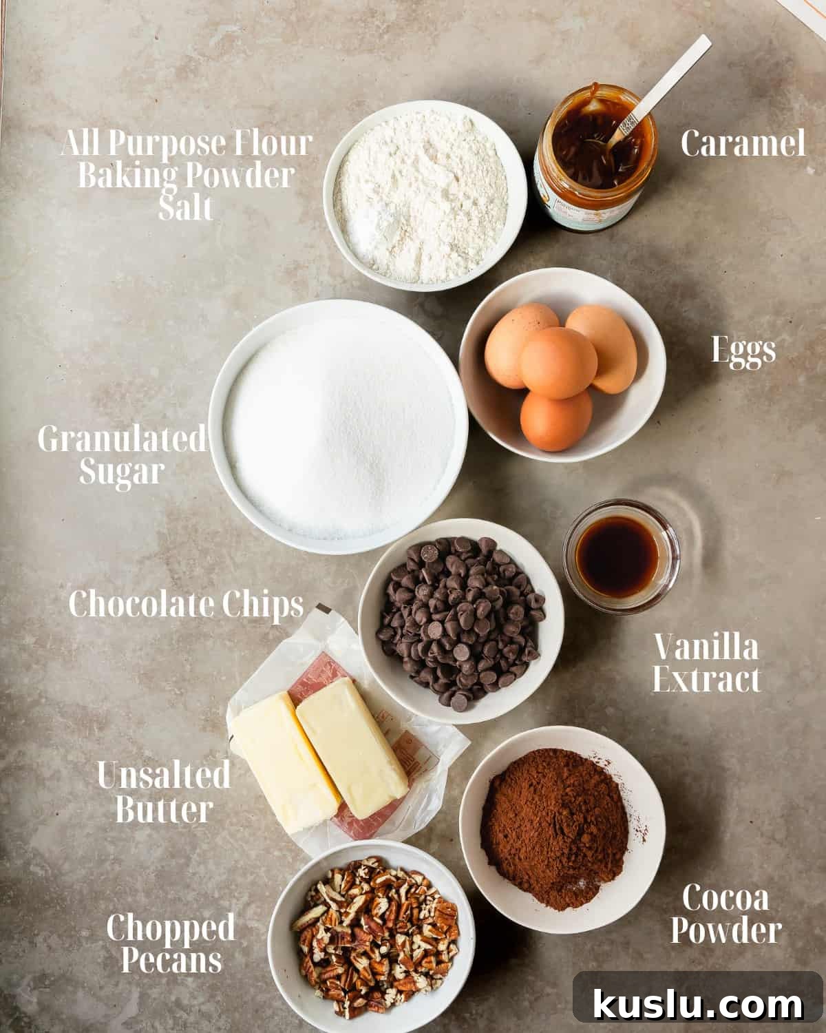 Dry Ingredients: Gather your all purpose, cocoa powder, baking powder and salt. 
Wet ingredients: Gather your butter, chocolate chips, sugar, eggs, vanilla extract and pecans.
Turtle Toppings: Gather your salted caramel sauce, pecans and more chocolate chips. 