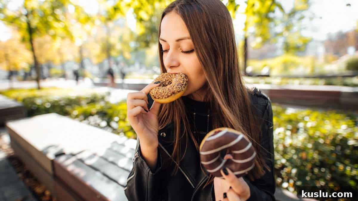 woman eating donuts