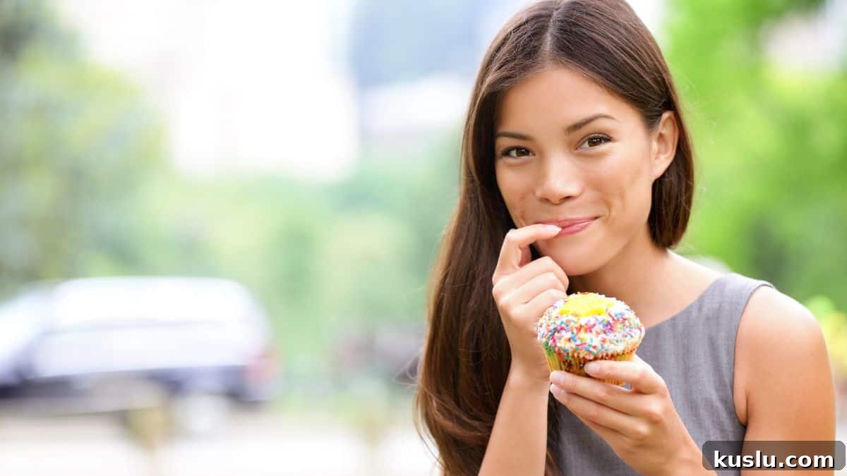 woman eating cupcake