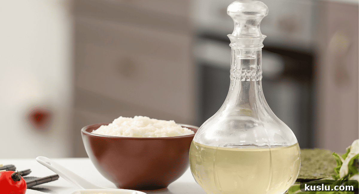 Image of rice vinegar next to bowl of rice.