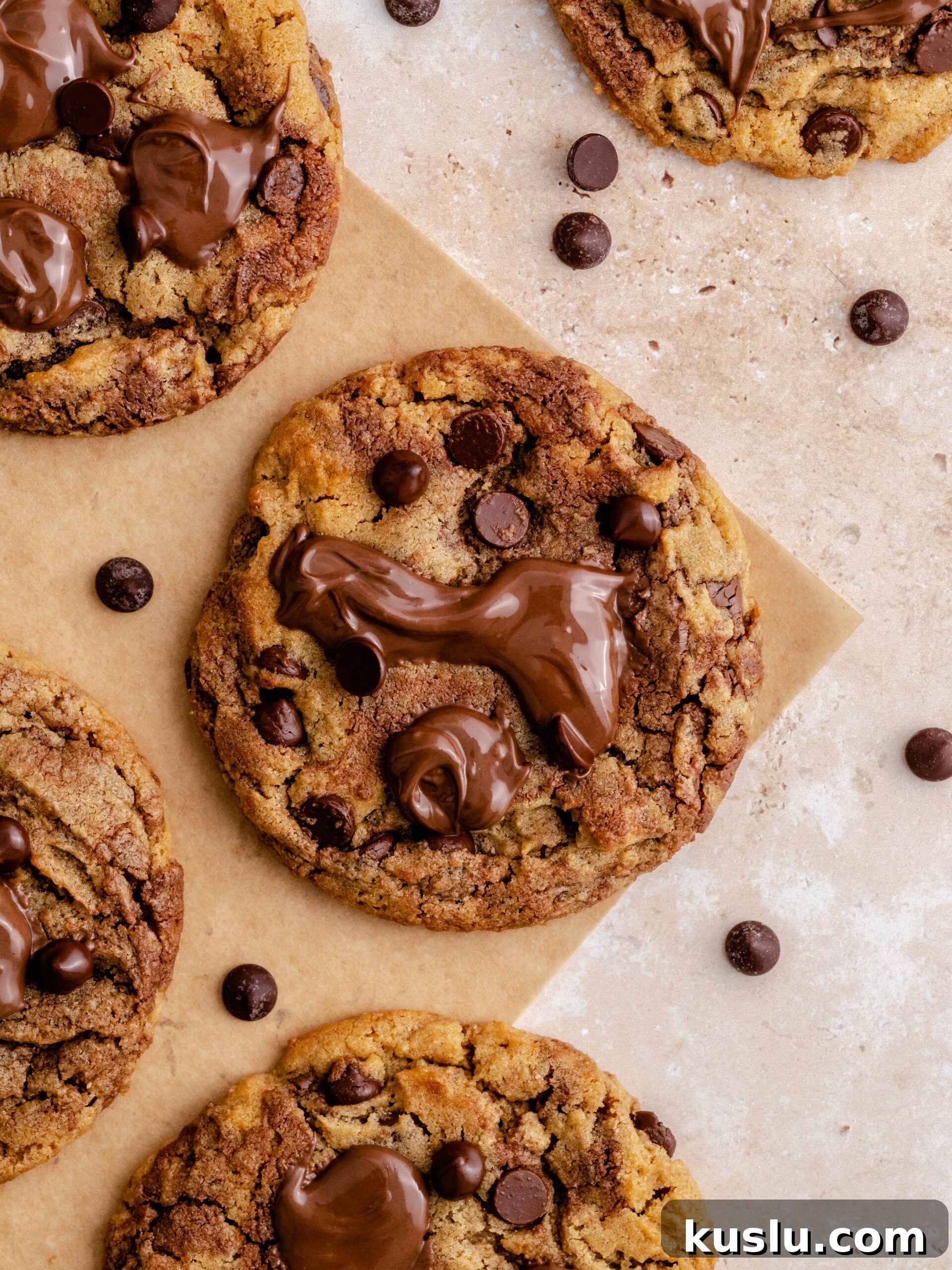 Nutella peanut butter cookies with dollops of Nutella on top of them.