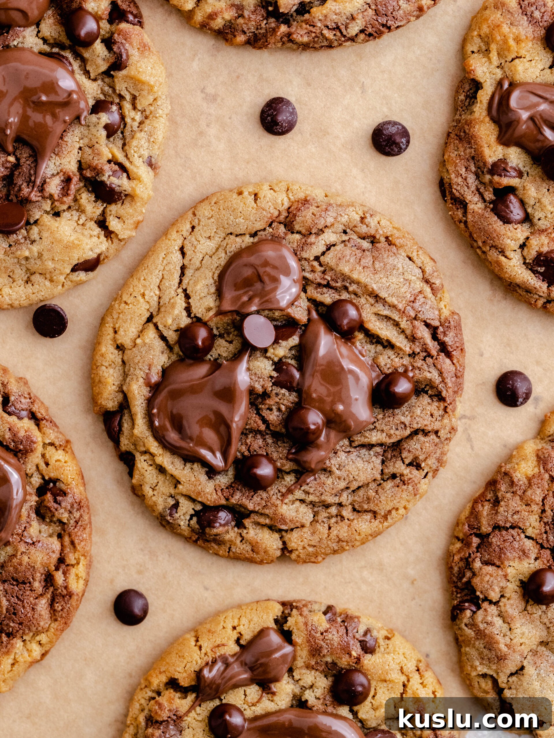 Nutella peanut butter cookies with dollops of Nutella on top of them.