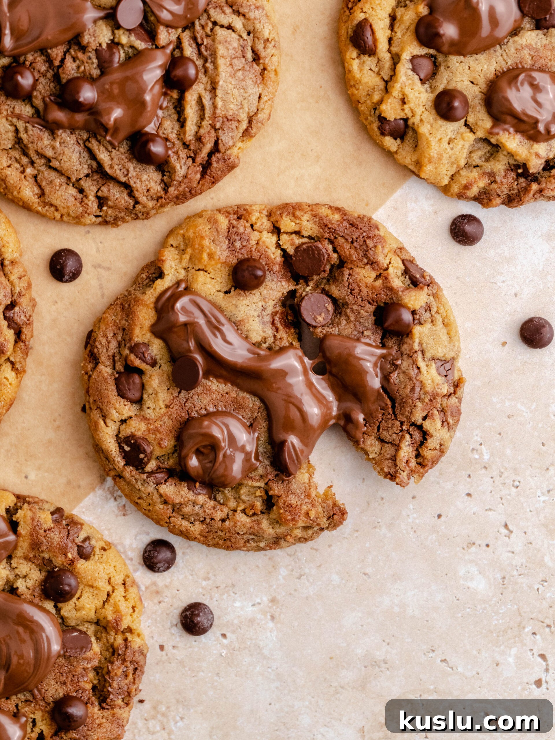 Nutella peanut butter cookie broken in half.