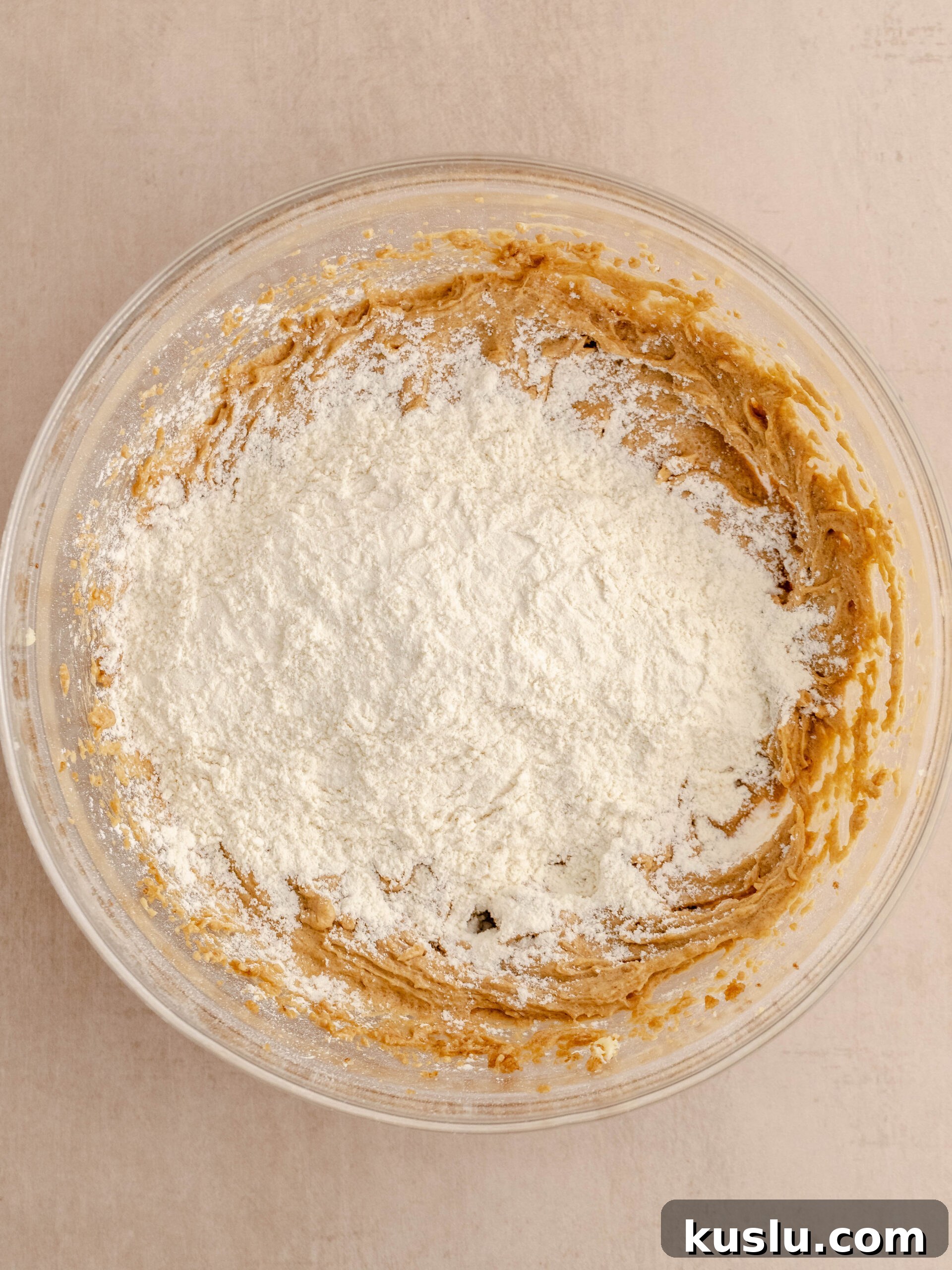 Flour added to the mixture.