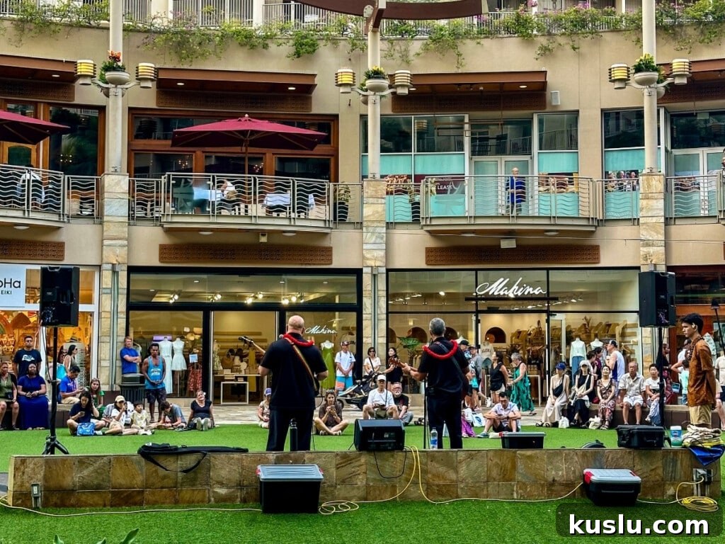 A live music performance taking place at the Waikiki Beach Walk precinct.