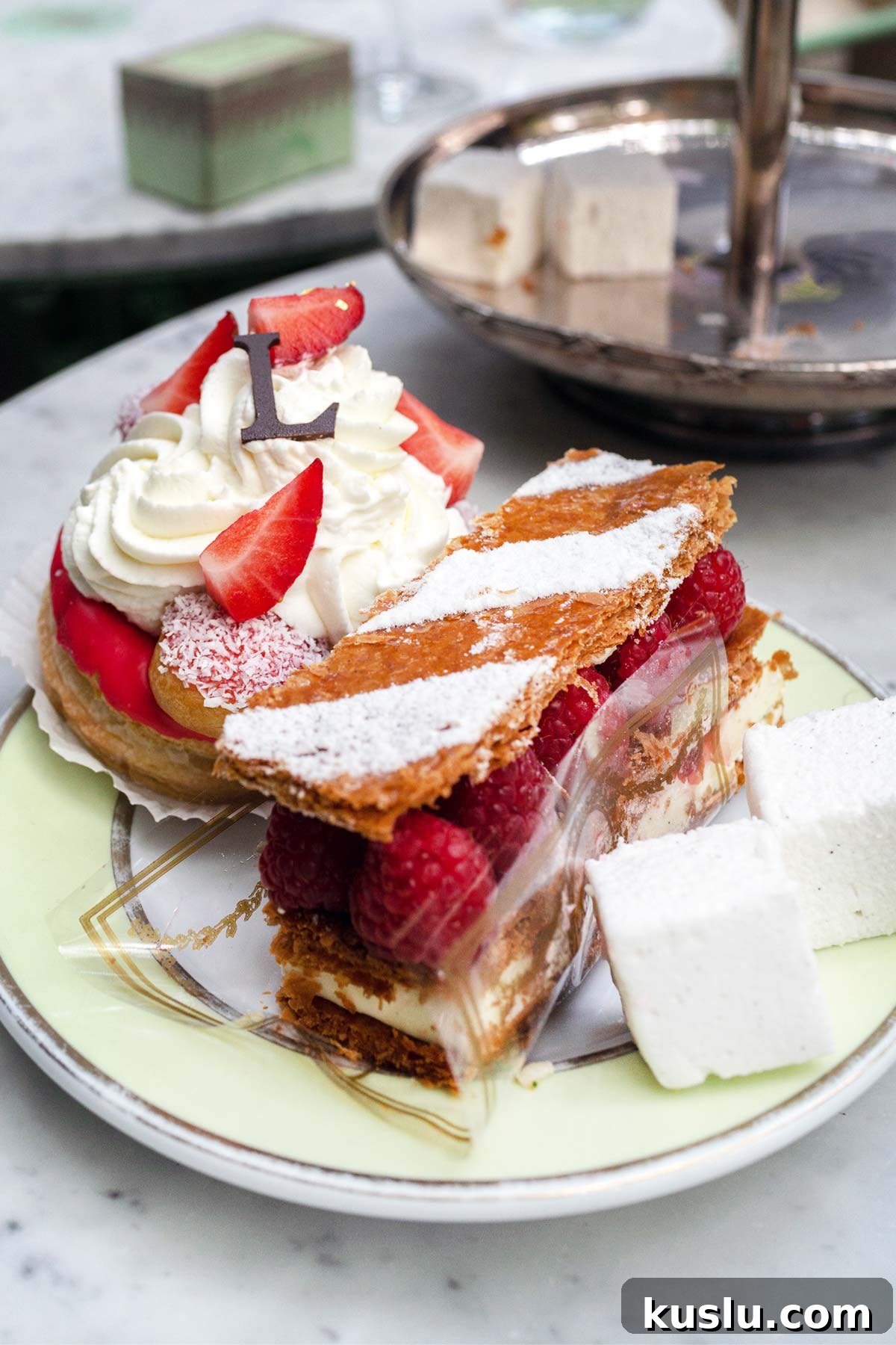 Laduree pastries on a plate.