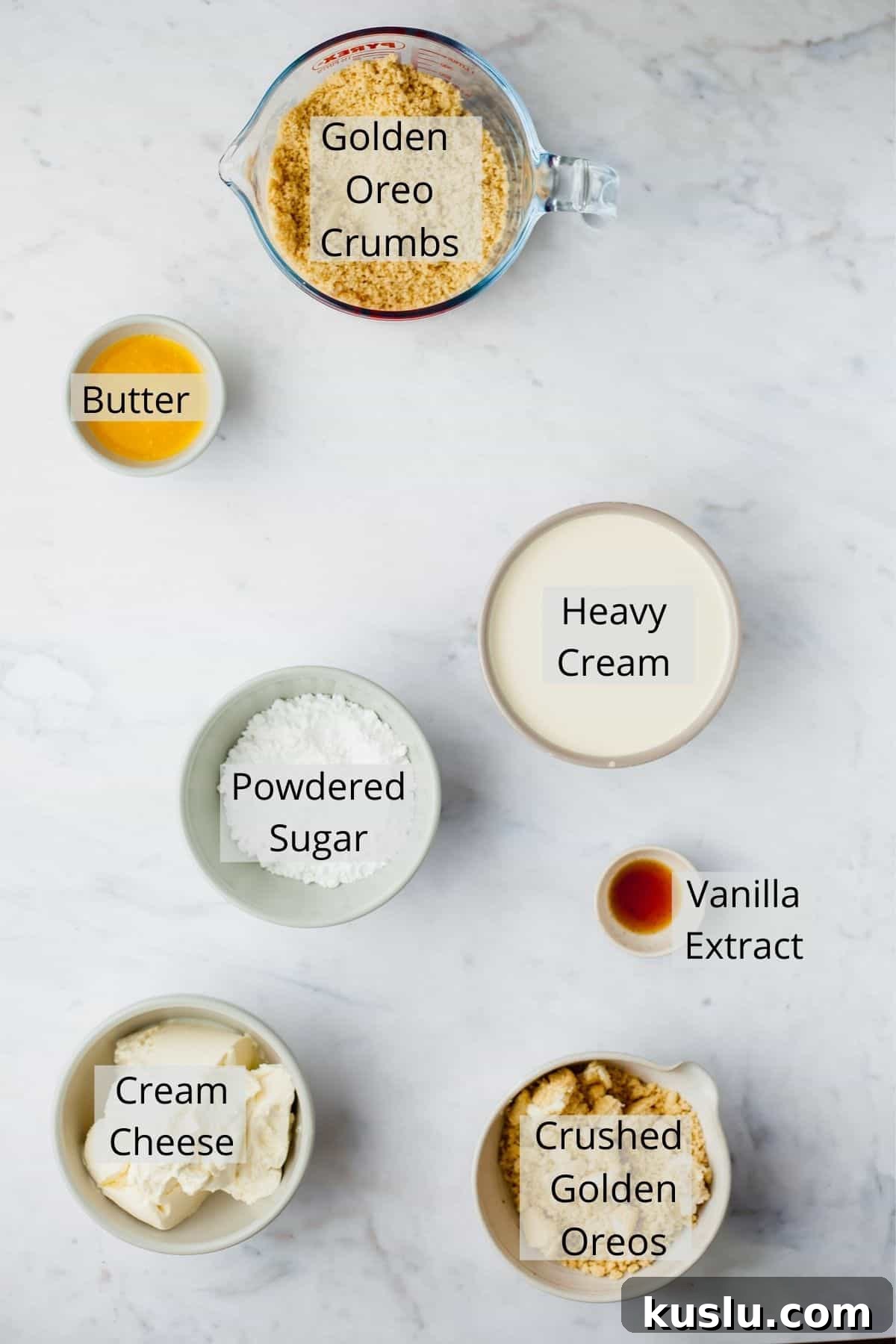 An overhead shot of ingredients needed for golden oreo cheesecake