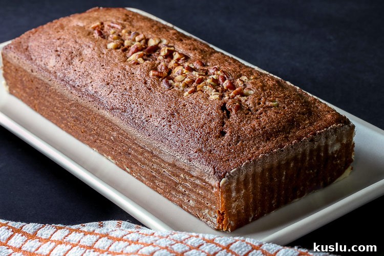 Gluten-Free Chocolate Tea Cakes Recipe for Moist Mini Cakes 4 whole cake with pecans; Gluten Free Chocolate Tea Cakes © 2019 Jane Bonacci, The Heritage Cook