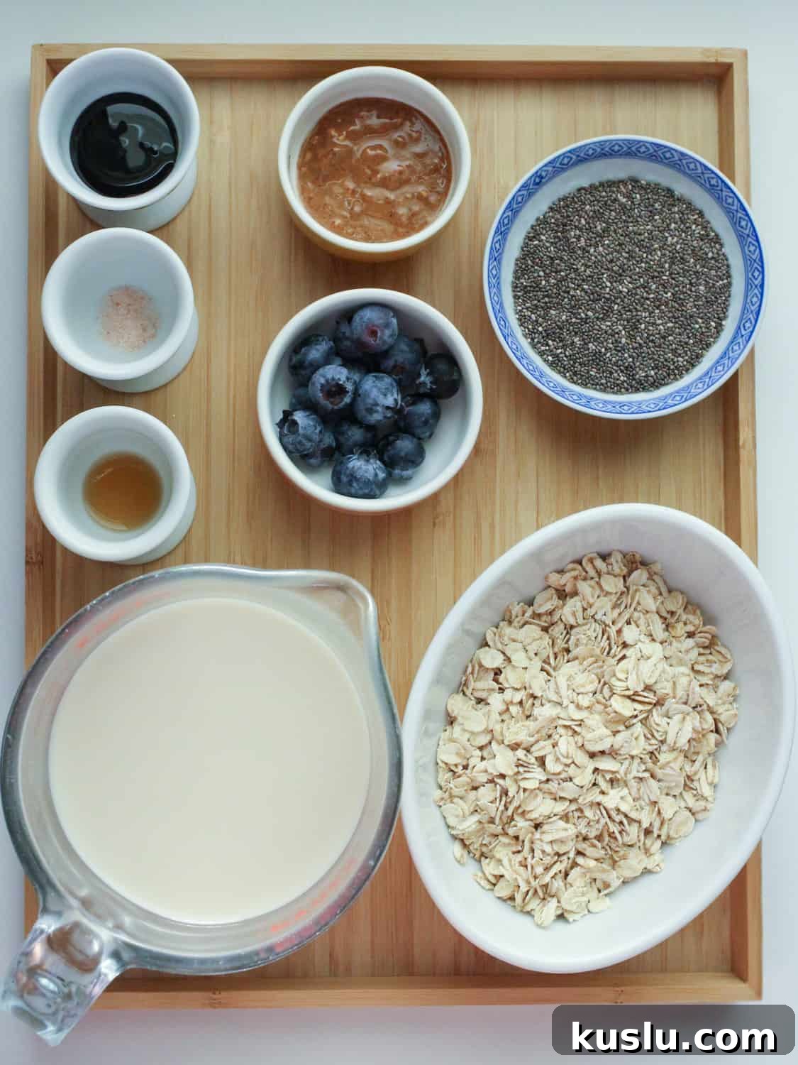 Blueberry Oat & Chia Porridge with Almond Butter (Vegan) 3 Photo of a tray of ingredients for this vegan oat and chia porridge.