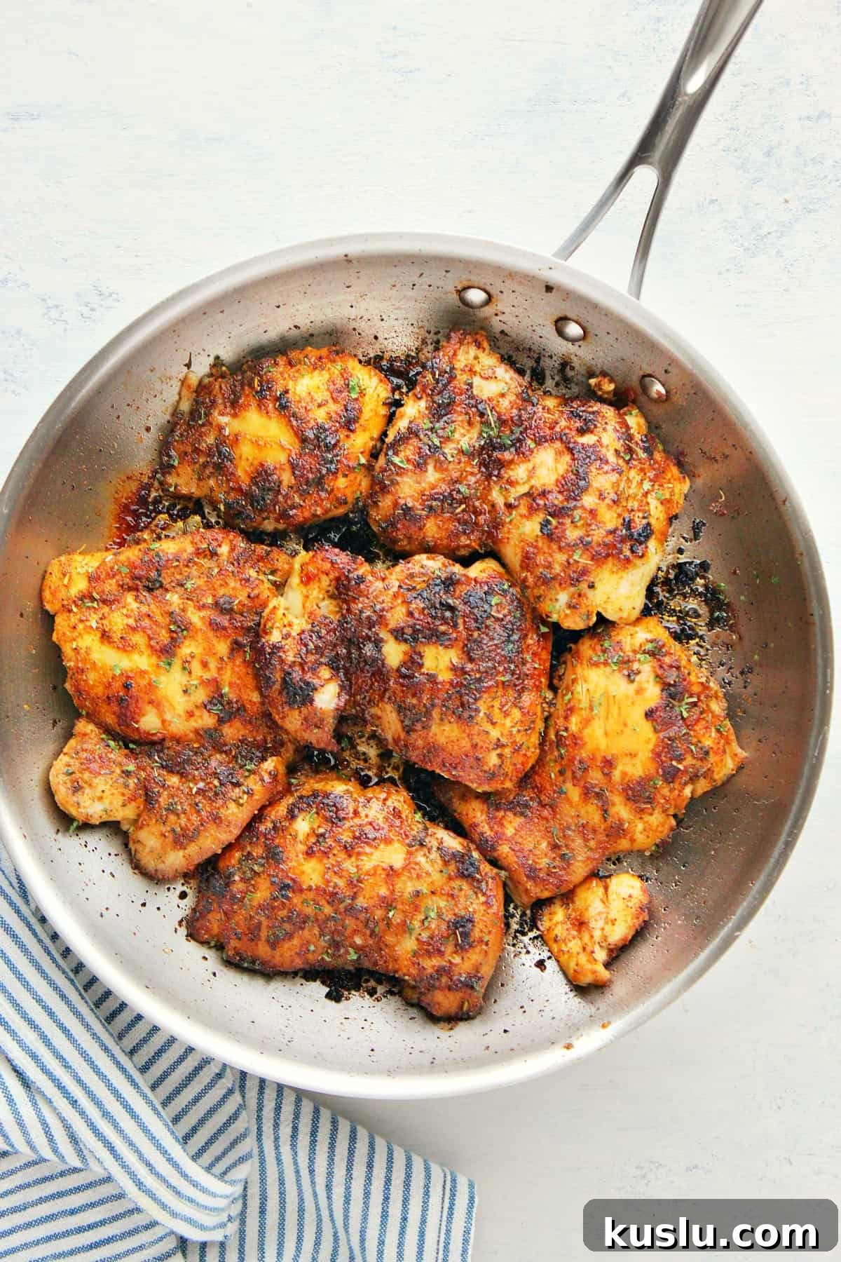 Stove Top Chicken Thighs recipe Chicken thighs in a skillet.